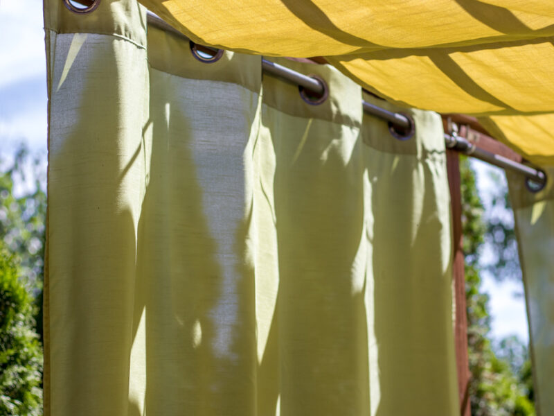 Green,Curtains,Provide,Shade,On,A,Homemade,Pergola,,On,A